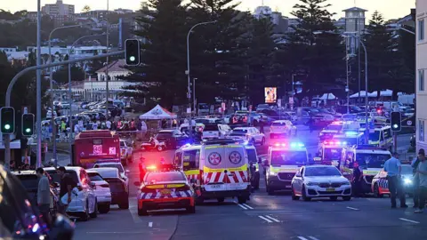 Fairfax Media Police cars on the road