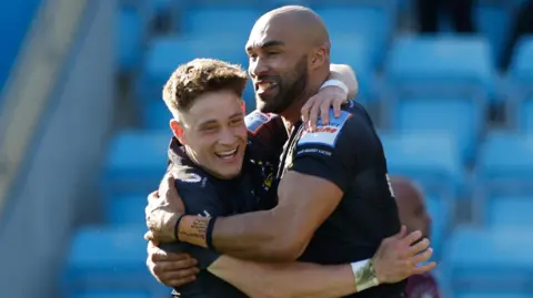 Stephen Varney and Olly Woodburn celebrate a try for Exeter