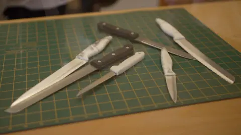BBC Range of different knives with sharp ends that are put on display as examples of potentially dangerous weapons
