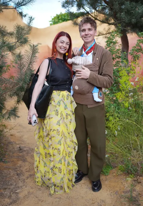 Yui Mok/PA Media Dianne Buswell and Joe Sugg, with their baby boy Bowden, during press day at the RHS Chelsea Flower Show, at the Royal Hospital Chelsea in London. Picture date: Monday May 18, 2026.