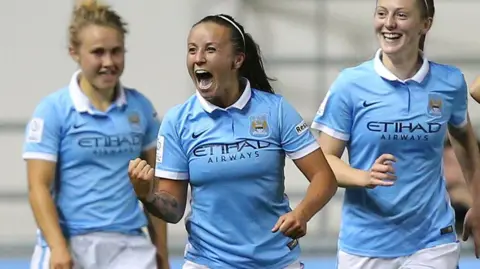 Getty Images Tash Harding celebrates after scoring a goal for Manchester City in 2015.