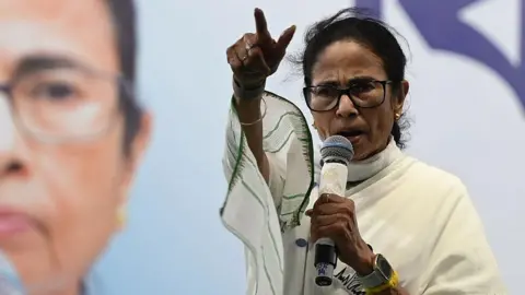  Chief Minister and All India Trinamool Congress (AITC) chairperson Mamata Banerjee address people in an election campaign rally in support of party's candidates for State Assembly Election at Beleghata on April 20, 2026 in Kolkata, India. (Photo by Samir Jana/Hindustan Times via Getty Images)