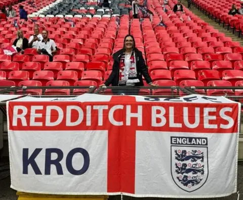 Lynda Courts Lynda Courts with the flag