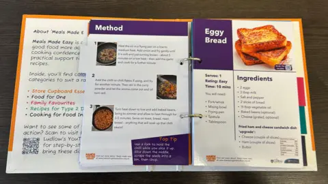 Better Together Ludlow A photograph of an open recipe book with instructions for an "Eggy Bread" receipe
