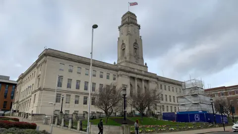 Barnsley Town Hall, a large, light-colored building constructed in a classical architectural style.
