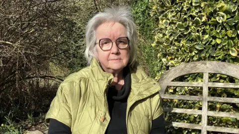 Phil Bodmer/BBC Sue Nelson was one of the driving forces behind a memorial garden close to the crash site at Great Heck