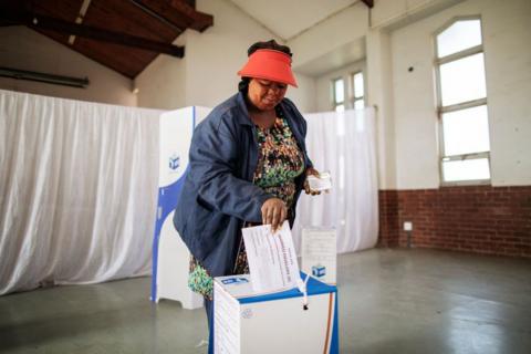 A voter casts her ballot during the special votes at the Glebe Community Hall voting station in Umlazi on May 28, 2024, the day ahead of the South African elections scheduled for May 29, 2024.