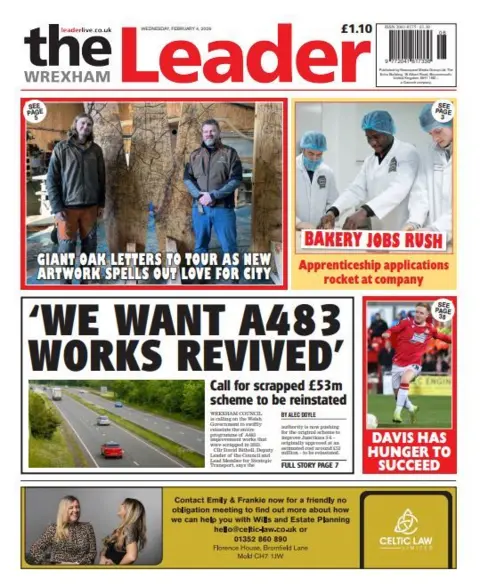 Wrexham Leader Wrexham leader front page. 'The headline reads: We want A483 works revived'. Other headlines read: 'Giant oak letters to tour as new artwork spells out love for city', and 'bakery jobs rush: apprenticeship applications rocket at company'. 
