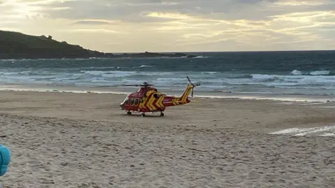 Gracie Dorrell  Air Ambulance on the beach