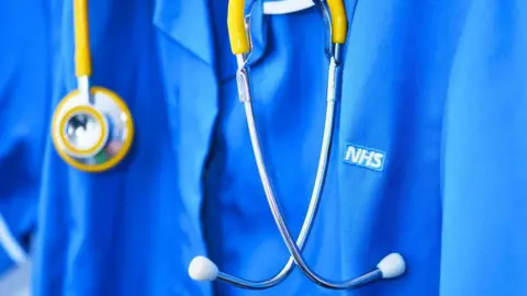 Getty Images A stock image of an NHS professional wearing a stethoscope. 