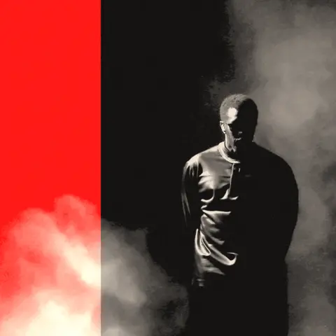 BBC A treated image showing Sean 'Diddy' Combs in black and white as he performs on stage, with smoke coming across the image