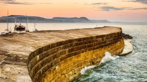 The curved stone pier at Lyme Regis