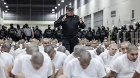 Deportees inside a prison in El Salvador