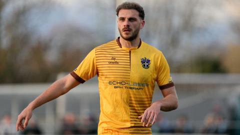 Harry Smith playing for Sutton United