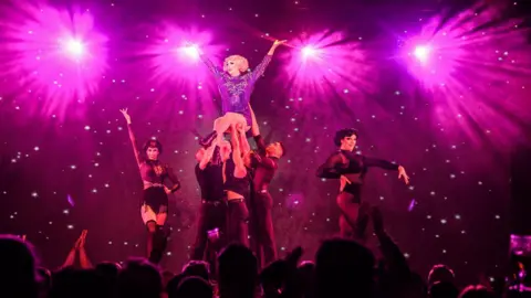 Pearl Mina  Dancing troupe perform on stage