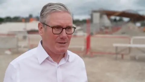 Sir Keri starter talking to the BBC