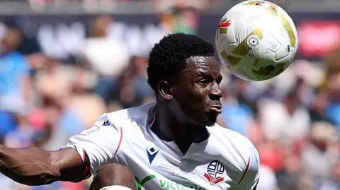 Jordi Osei-Tutu controls the ball for Bolton Wanderers during their League One play-off final win over Stockport County