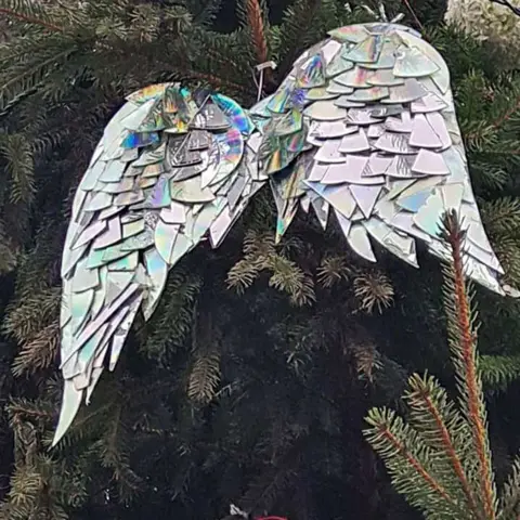 Estela Oduntan Christmas tree decorations in Wisbech