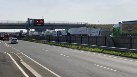 Jozef Hall/BBC Vehicles queuing on the A14