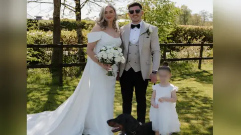 67ff59b0-536b-11f1-b319-63ed6ac90e5f.png Bride weds in dressing gown, slippers and rollers as 'it's what married life is like'