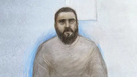 Elizabeth Cook/PA Wire Court artist sketch by Elizabeth Cook of Mohammad Bashir appearing at the Old Bailey in London,