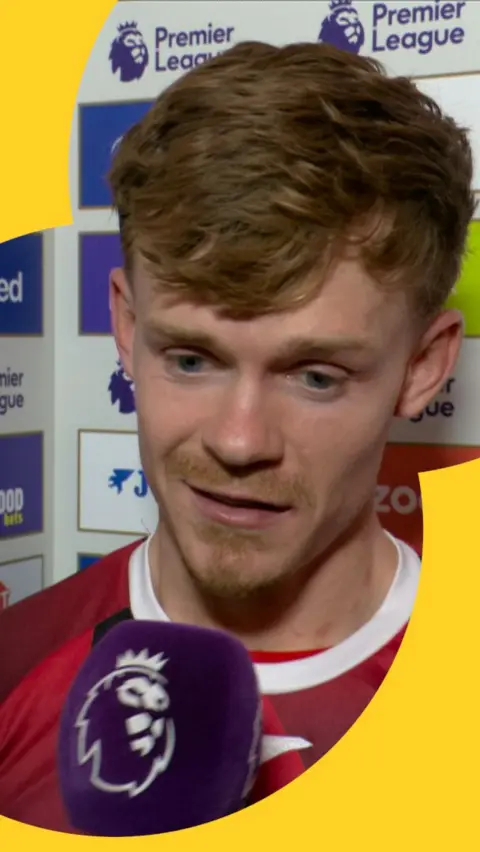 Brentford's Keane Lewis-Potter speaking in the tunnel after beating Tottenham