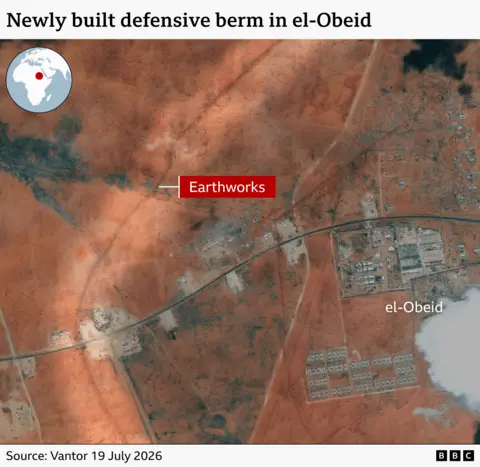 A satellite image showing a defensive earth berm around the periphery of el-Obeid.
