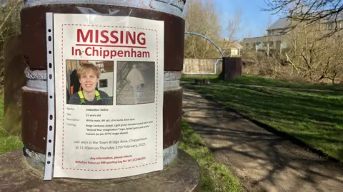 A poster which says 'Missing in Chippenham' then has a boy's face beneath it.