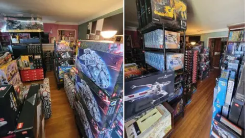 Photos of Lego sets stacked meticulously in what appears to be a living room in a home. Some of the stacks reach the roof and are organised by the type of Lego set. 