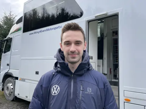 Meirion Evans with Melfyn Evans Motorsport team van