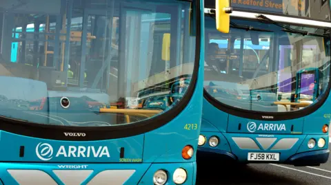 BBC Arriva buses in a station