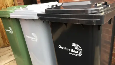 A view of bins with Cheshire East Council branding