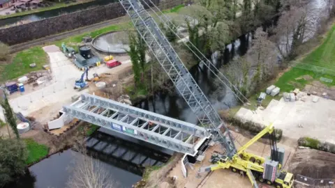 Severn Trent A bridge being laid over the River Derwent