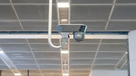 Getty Images A surveillance camera in an office