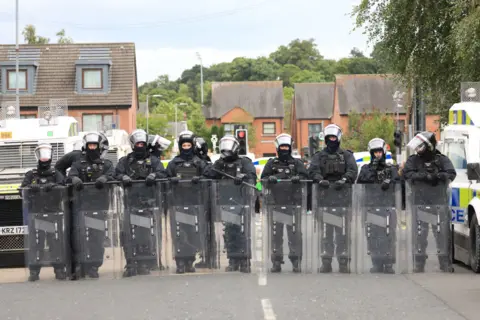 PA Riot police line on lower Ormeau Road belfast