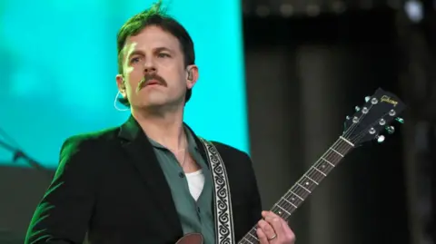 Caleb Followill of Kings of Leon performs during Extra Innings Festival 2025