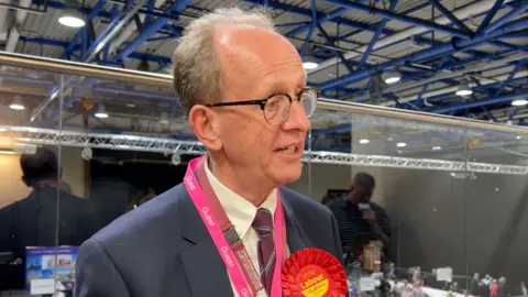 Stephen Houghton reacts to keeping his seat by just 23 votes.