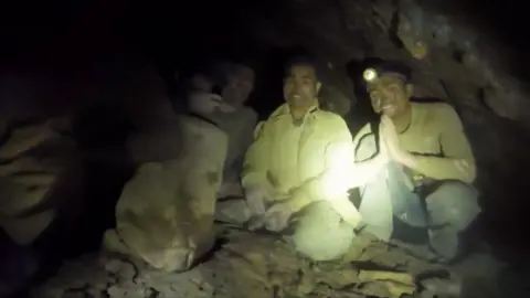 Suvivors inside cave