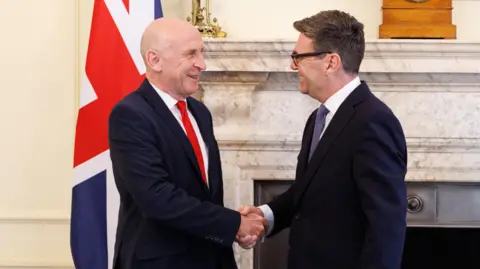 Simon Dawson Prime Minister Andy Burnham appoints John Healey as Chancellor of the Exchequer in 10 Downing Street.