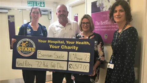 Salisbury NHS Foundation Trust Image of the Rileys with staff from the Benson Suite at Salisbury District Hospital