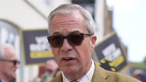 Nigel Farage is wearing sunglasses
