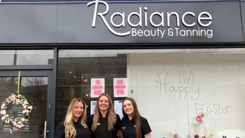 LDRS Chloe and two members of her team outside Radiance Beauty and Tanning