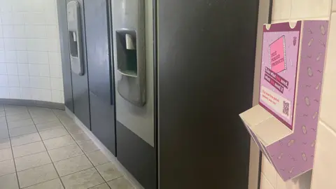 BBC Empty period product dispenser Jersey toilet