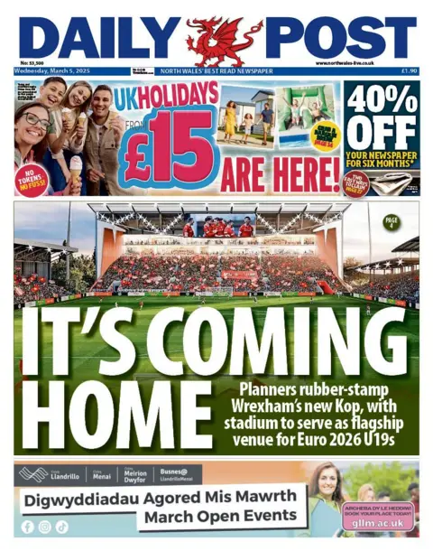 Daily Post Daily Post newspaper front page shows main headline in front of a photo of a football pitch: It's coming home; Planners rubber-stamp Wrexham's new Kop, with stadium to serve as flagship venue for Euro 2026 under 19's.