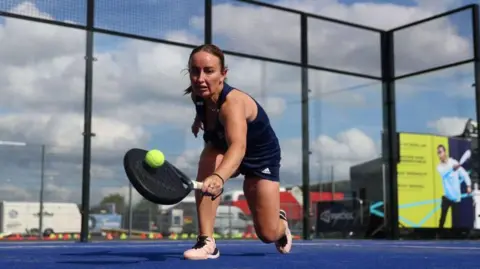 Getty Images Aimee Gibson plays a shot at the F1 British Grand Prix event at Silverstone she finds padel a fun and social game.