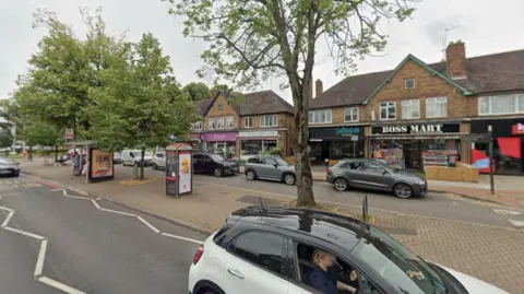 General view of a row of shops on Stratford Road, Shirley