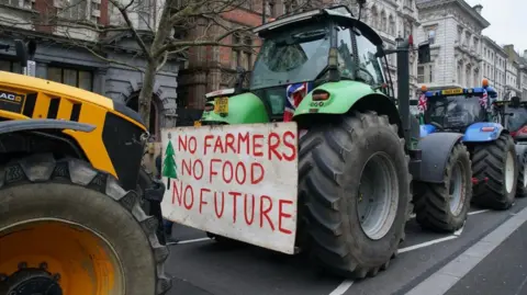 PA Media Farmers and their tractors protest in Westminster, London over the changes to inheritance tax (IHT) rules in the budget which introduced new taxes on farms worth more than £1 million. Picture date: Monday February 10, 2025.