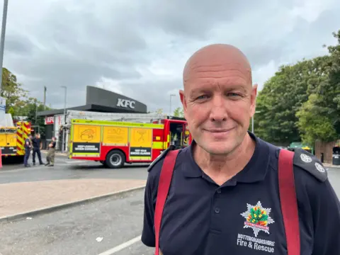 Firefighter looking at camera
