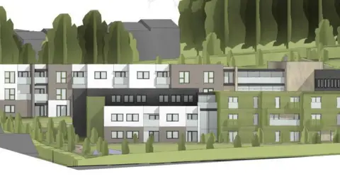 Trewin Design Architects An artist's impression of the 71 apartments. They are grey, black, white, or green. The flats are not high-rise, but rather spread out across a larger space.