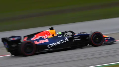 Isack Hadjar in the Red Bull RB22 at the Circuit de Barcelona-Catalunya